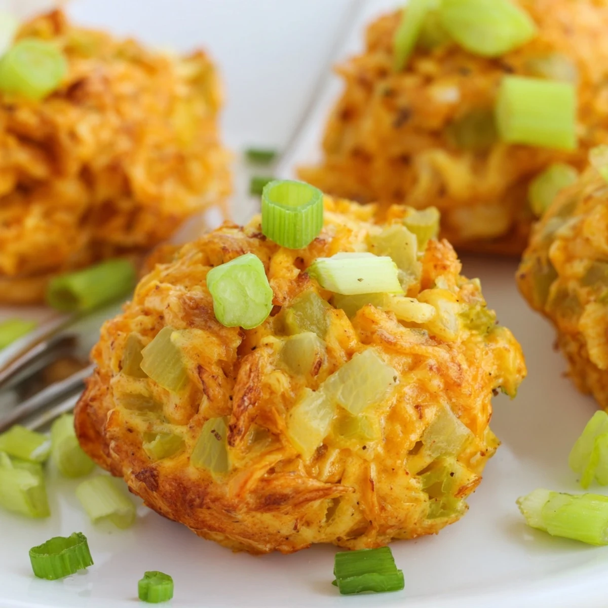Fluffy Buffalo Chicken Pickle Soda Fork Cakes lightly fried, showcasing spicy, tangy flavors and textures.