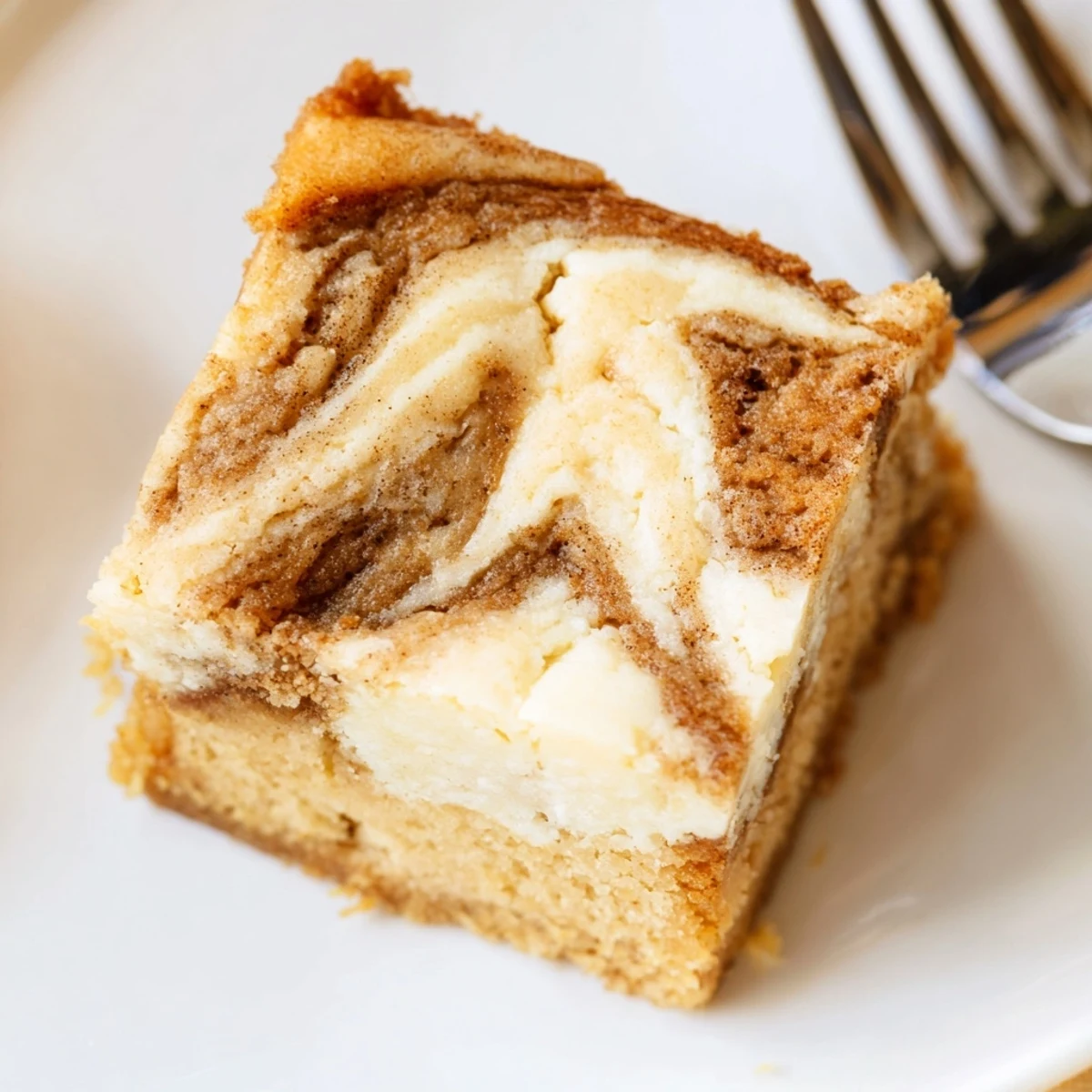 Decadent Spiced Sweet Tea Cheesecake Blondies, perfect with whipped cream and citrus hints.