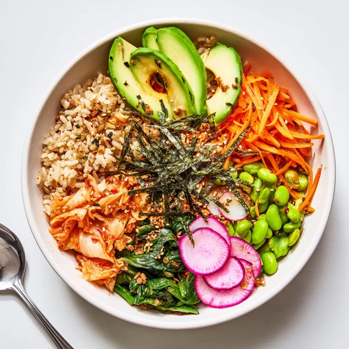 A colorful Fermented Vegetable Bowl filled with tangy kimchi, fresh veggies, and grains.  