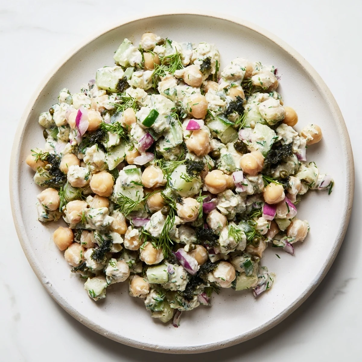 Delicious and hearty chickpea tuna salad served on whole-grain bread, perfect for a quick lunch.