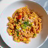 Creamy One-Pot Mexican Street Corn Pasta in a single pot, bursting with corn and zesty flavors.