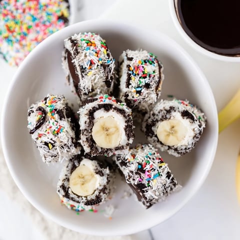 Oreo Cookie Sushi Rolls with chocolate dip, artfully arranged and ready to be devoured.