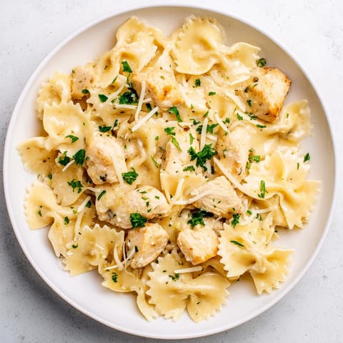 Golden, bite-sized chicken pieces in the Mozzarella Garlic Butter Chicken Bowties with melted cheese and herbs.
